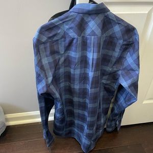 Jared Lang after after dark blue plaid shirt.